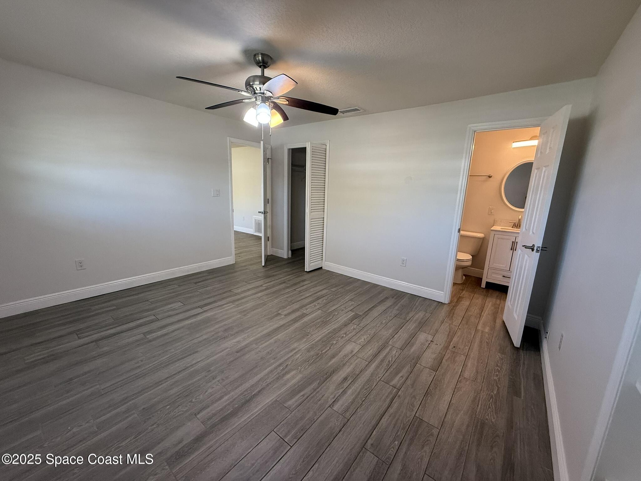 2801 Lorna Drive Melbourne, FL 32935 - Photo 6 of 25 a view of a livingroom with wooden floor