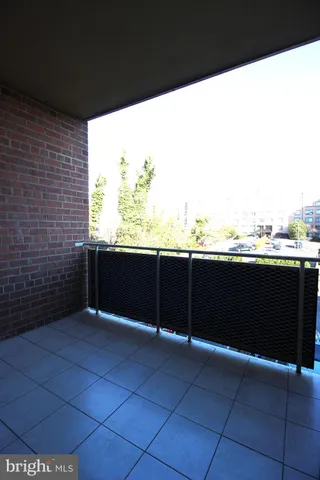 a view of a balcony with city view