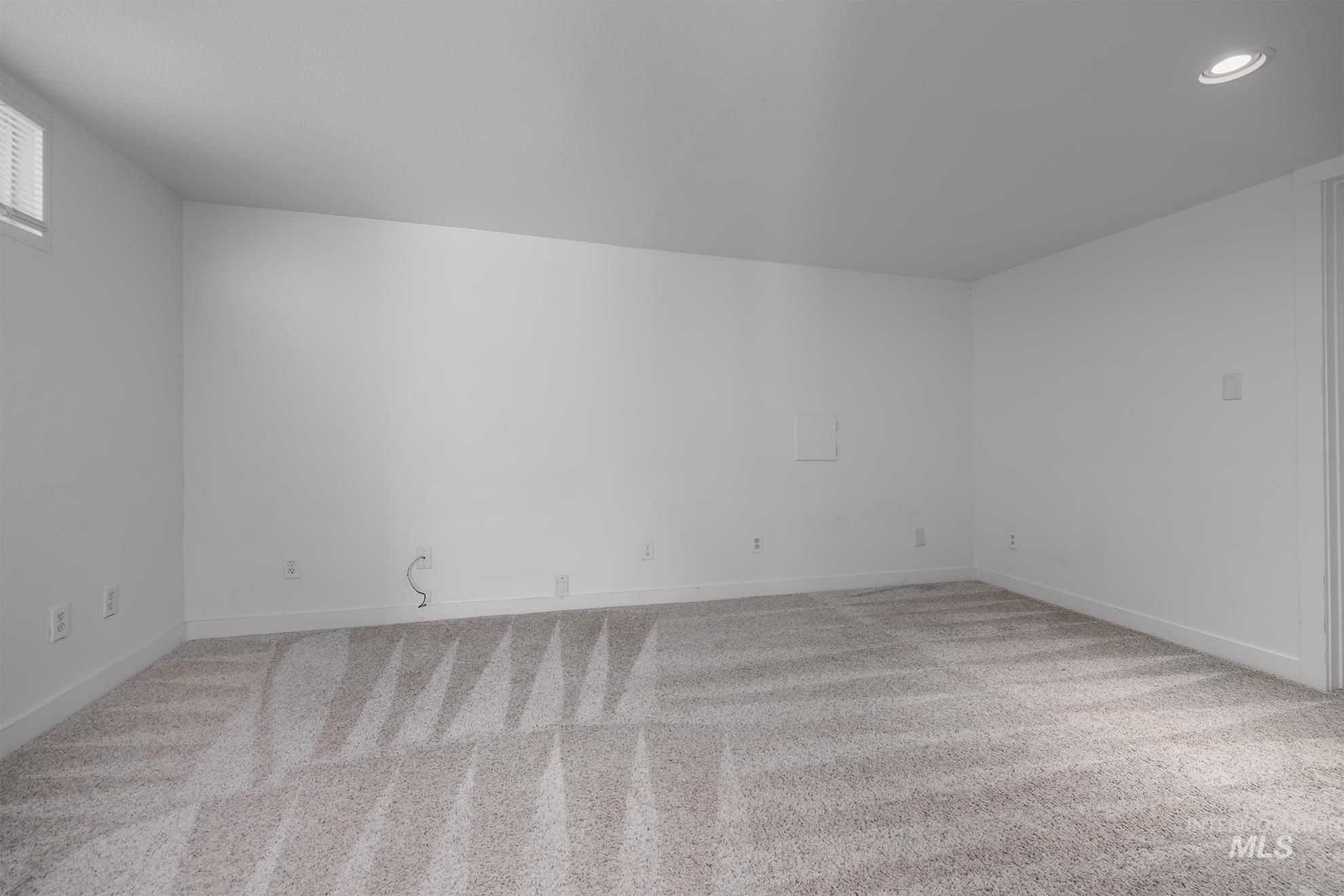 1016 West 5th Street Weiser, ID 83672 - Photo 18 of 36 Additional living space with light colored carpet and recessed lighting