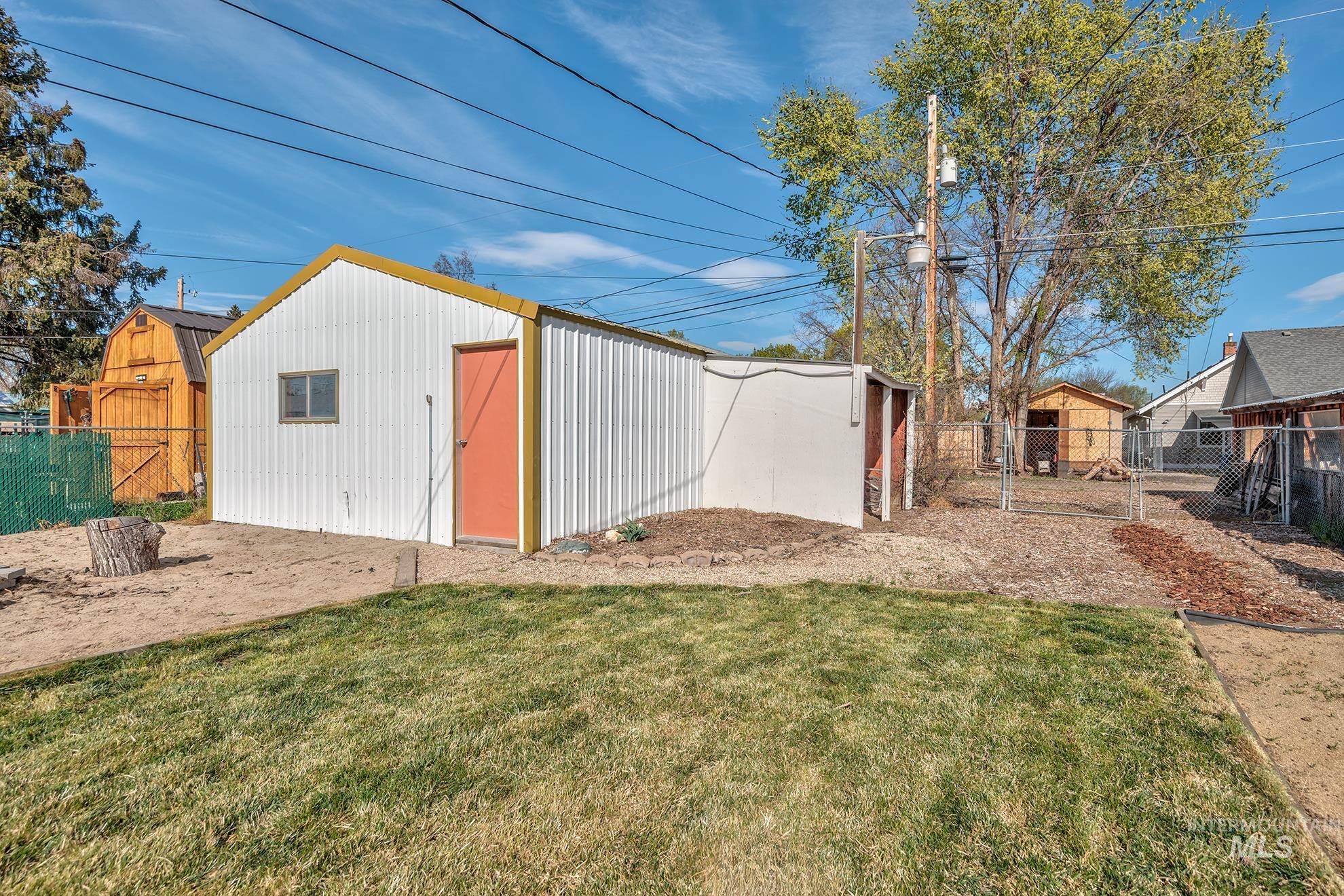 1016 West 5th Street Weiser, ID 83672 - Photo 27 of 36 Fenced backyard featuring an outbuilding