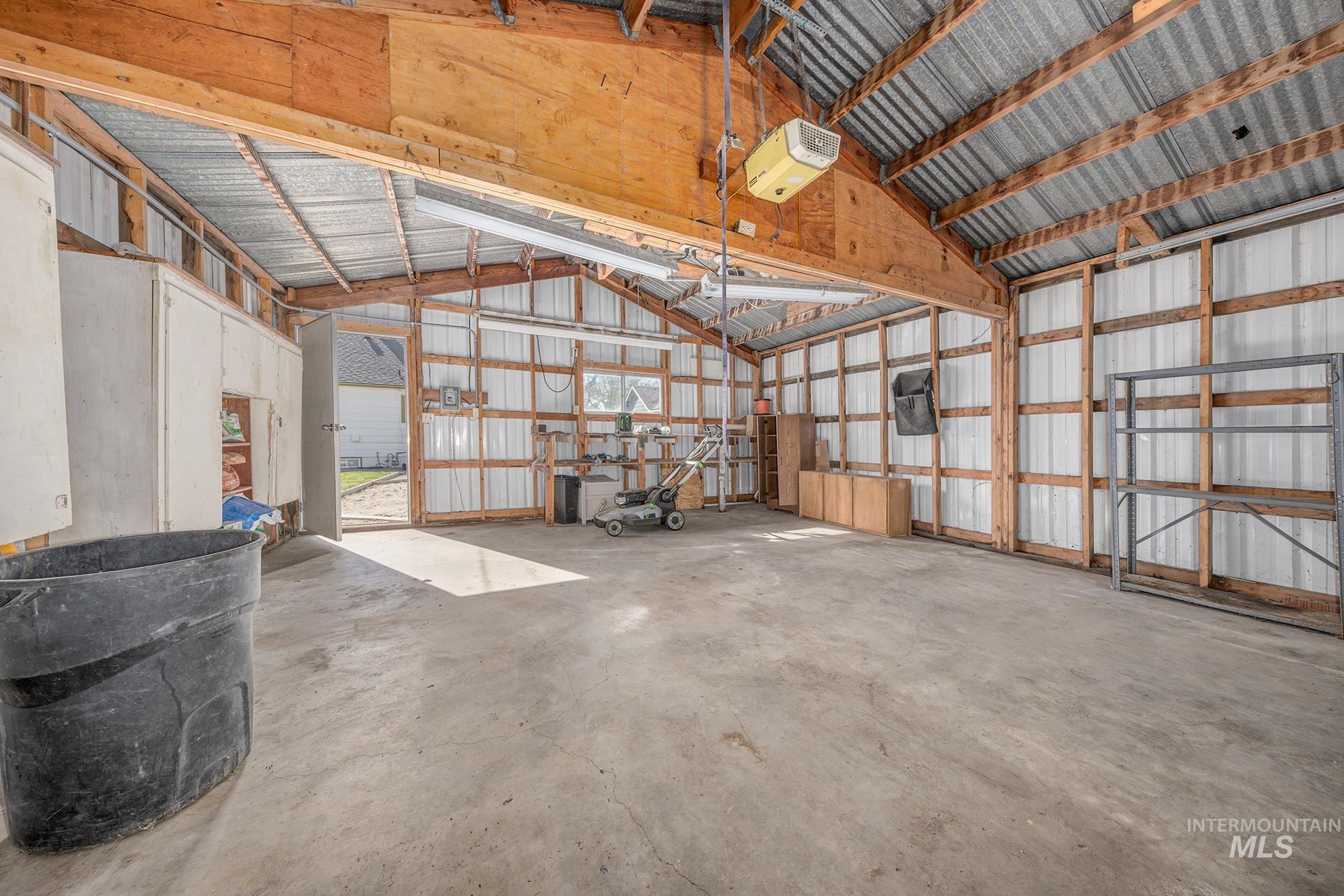 1016 West 5th Street Weiser, ID 83672 - Photo 28 of 36 Garage with metal wall and a garage door opener