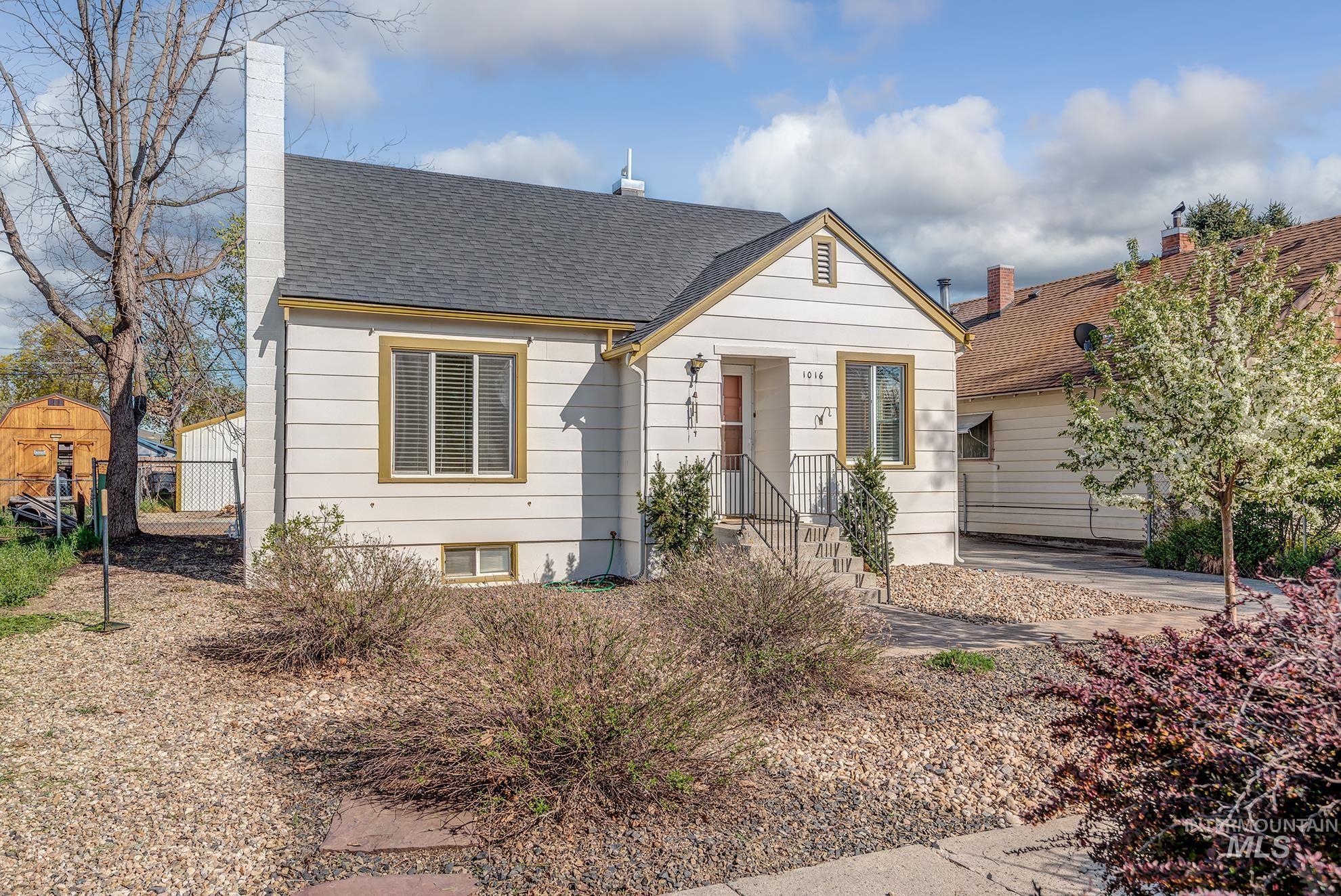1016 West 5th Street Weiser, ID 83672 - Photo 36 of 36 View of front facade with a shingled roof and a chimney