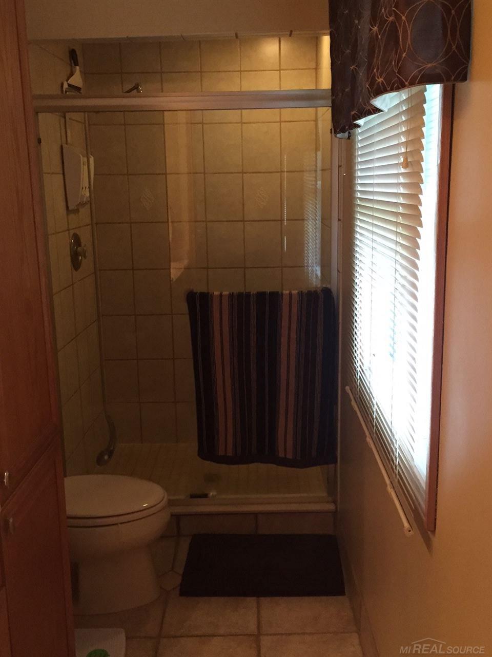 61356 North Ridge Trail Washington, MI 48094 - Photo 23 of 42 Large walk in shower