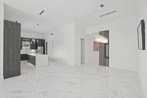 a bathroom with a toilet sink and a shower