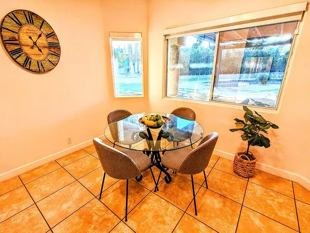 a table and chairs in a room