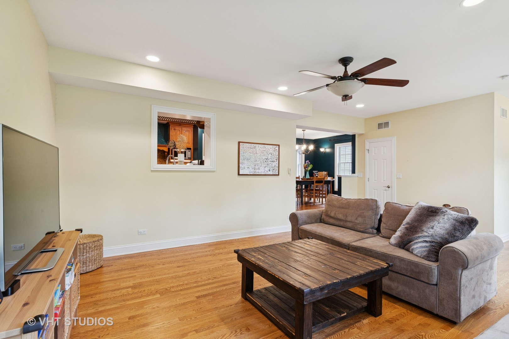 720 Beaver Road Glenview, IL 60025 - Photo 10 of 28 a living room with furniture and a flat screen tv