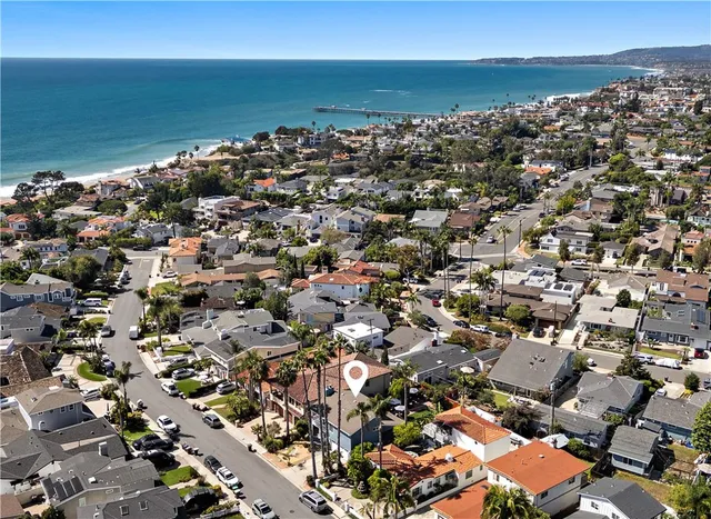 an aerial view of beach and ocean