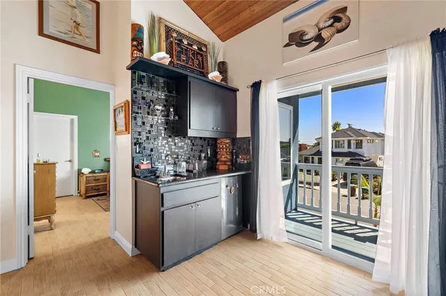 a kitchen view with a stove and a refrigerator