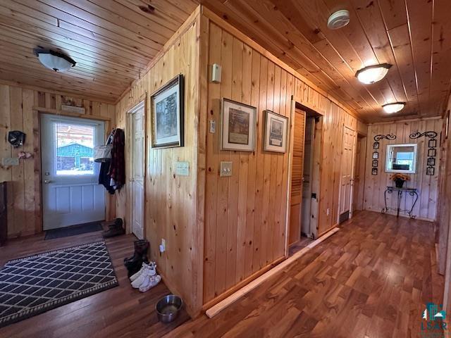 1383 Kelly Trail Isabella, MN 55607 - Photo 10 of 40 Hallway with wood walls, wood finished floors, and wooden ceiling