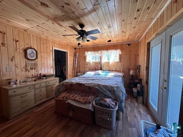 1383 Kelly Trail Isabella, MN 55607 - Photo 12 of 40 Bedroom featuring wooden walls, wood ceiling, and dark wood-style flooring