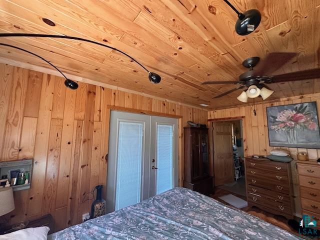 1383 Kelly Trail Isabella, MN 55607 - Photo 13 of 40 Bedroom featuring wooden walls and wood ceiling