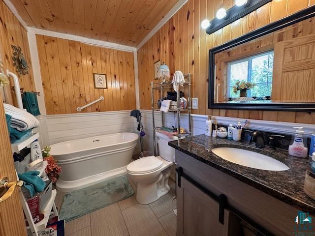 1383 Kelly Trail Isabella, MN 55607 - Photo 18 of 40 Full bath featuring a soaking tub, vanity, wood walls, and wooden ceiling