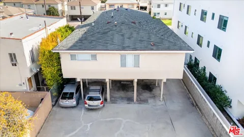 a view of a house with sitting area and furniture