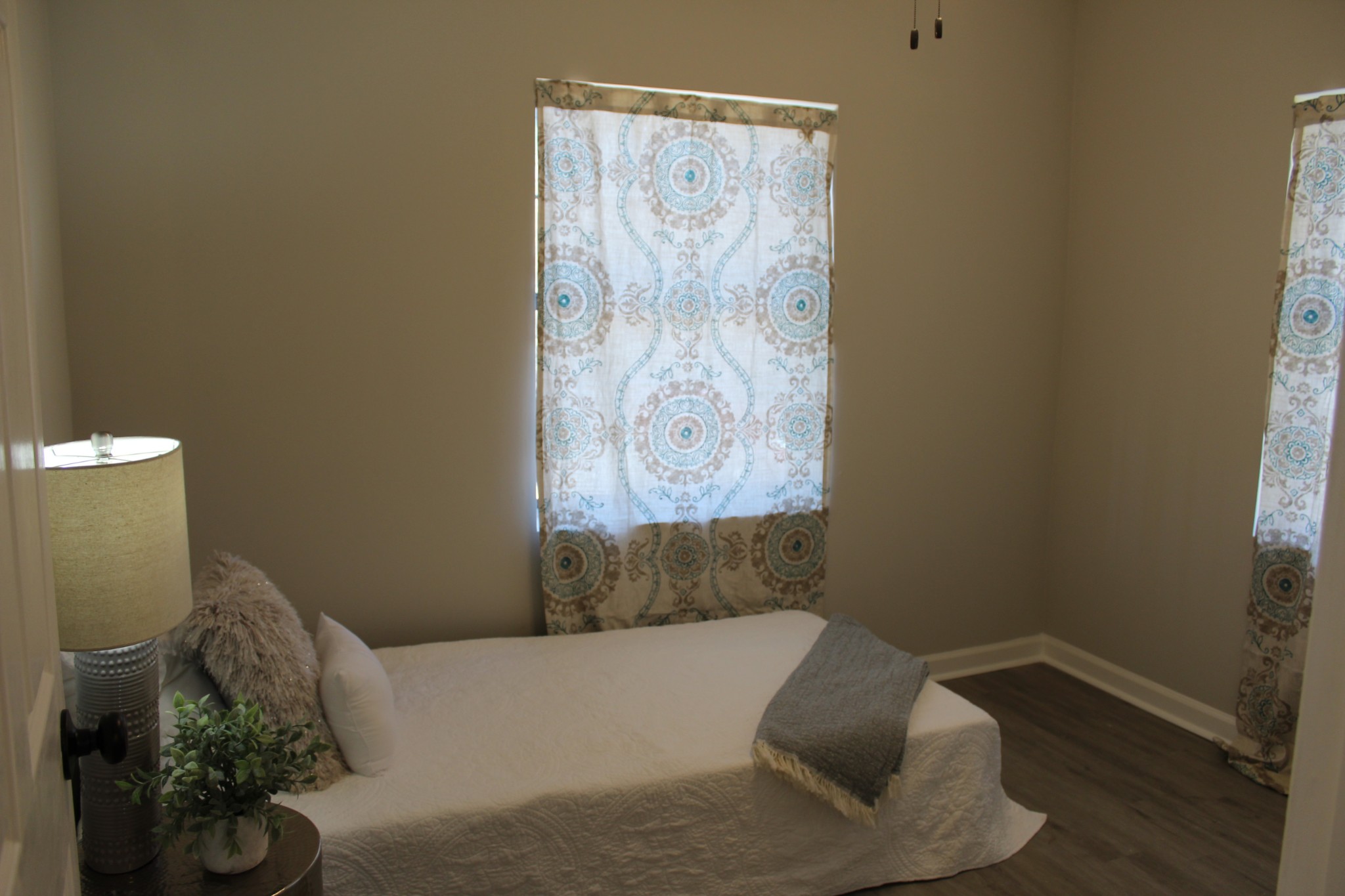 521 Forest Park Road Madison, TN 37115 - Photo 11 of 15 a living room with furniture and a window
