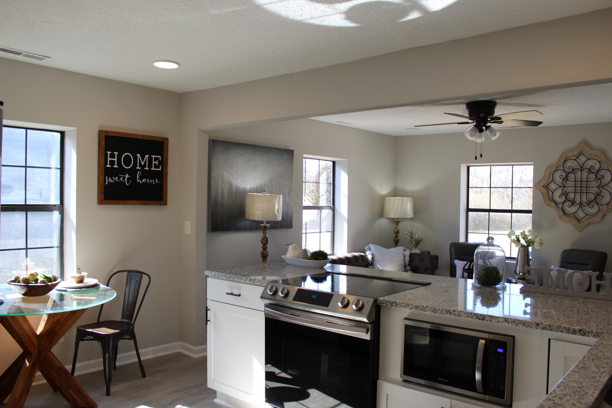 521 Forest Park Road Madison, TN 37115 - Photo 4 of 15 a kitchen with a stove a sink and a refrigerator