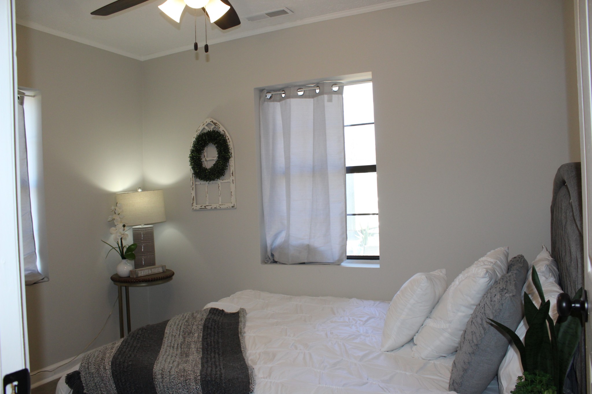 521 Forest Park Road Madison, TN 37115 - Photo 7 of 15 a bedroom with a bed and a chandelier