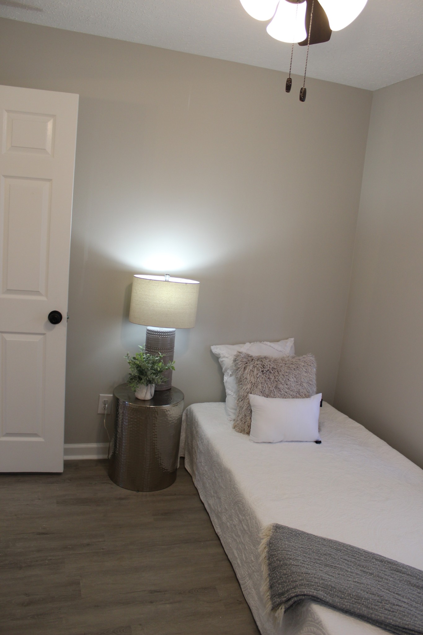 521 Forest Park Road Madison, TN 37115 - Photo 10 of 15 a bedroom with a bed and a lamp