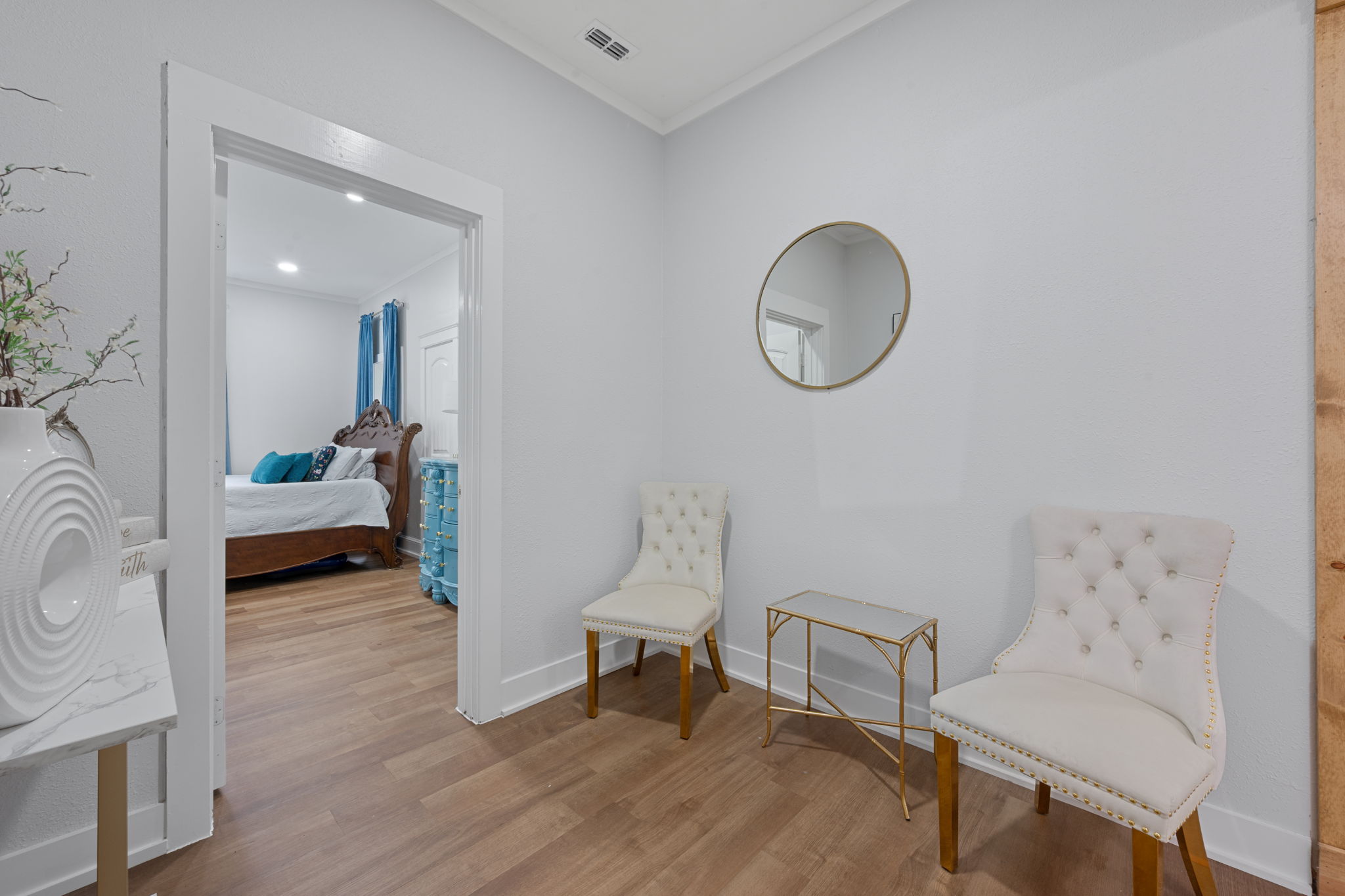 602 East 6th Street Cameron, TX 76520 - Photo 11 of 40 Entryway featuring wood-finish flooring, white trim, and light gray walls