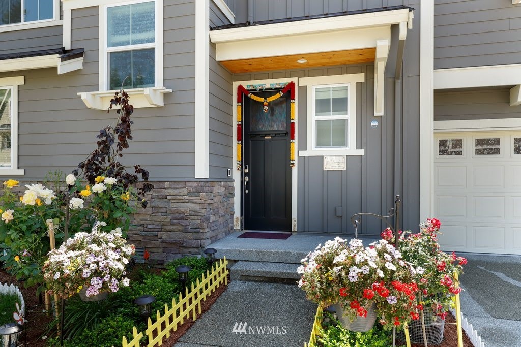 4606 187th Place Southeast Bothell, WA 98012 - Photo 3 of 40 a front view of a house