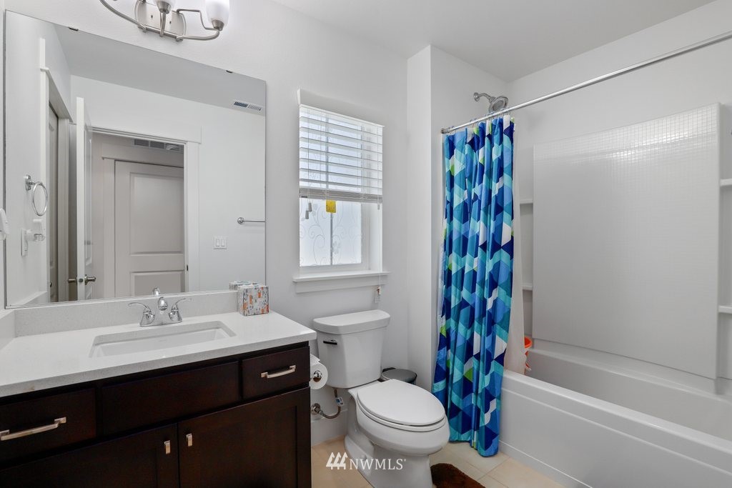 4606 187th Place Southeast Bothell, WA 98012 - Photo 22 of 40 a bathroom with a sink toilet and shower