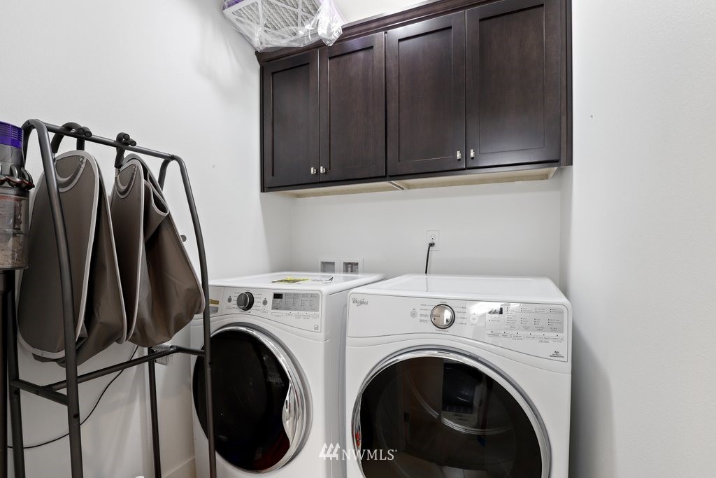 4606 187th Place Southeast Bothell, WA 98012 - Photo 23 of 40 a view of entryway with washer and dryer