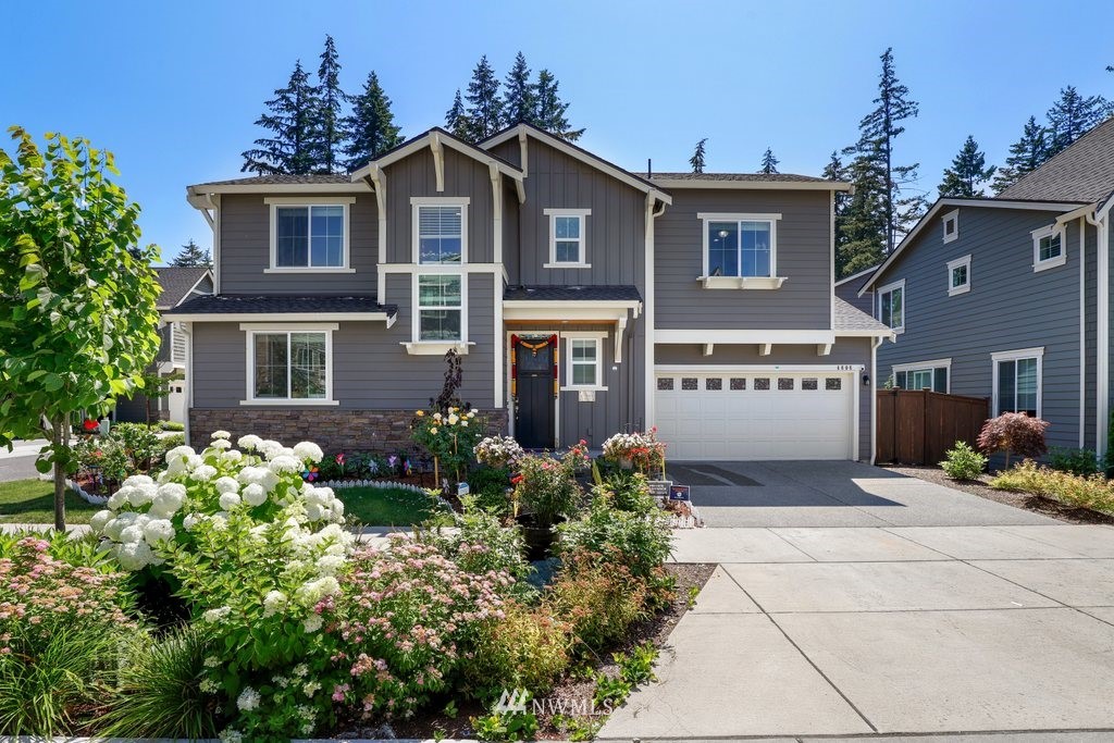 4606 187th Place Southeast Bothell, WA 98012 - Photo 29 of 40 front view of a house with a yard