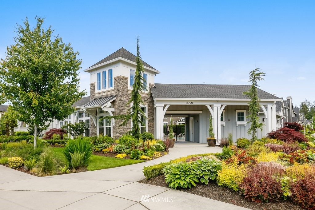 4606 187th Place Southeast Bothell, WA 98012 - Photo 30 of 40 a front view of a house with a garden