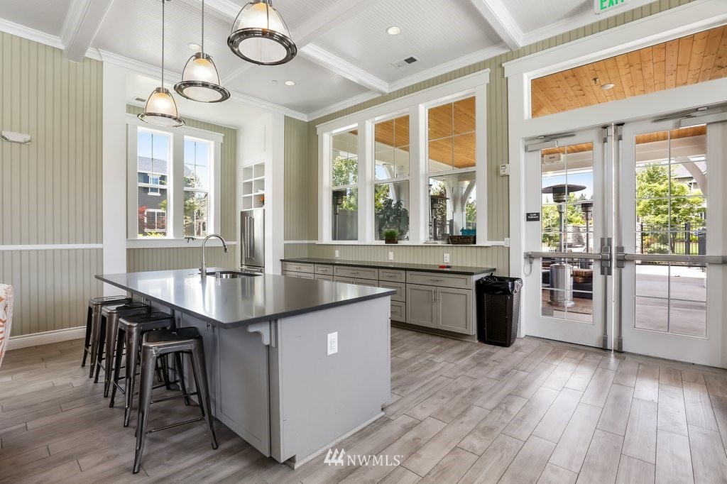 4606 187th Place Southeast Bothell, WA 98012 - Photo 36 of 40 a kitchen with counter top space and wooden floor