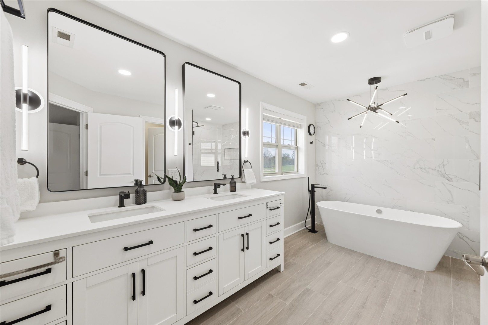 409 Provence Court Lisle, IL 60532 - Photo 11 of 24 a bathroom with a double vanity sink mirror double and bathtub