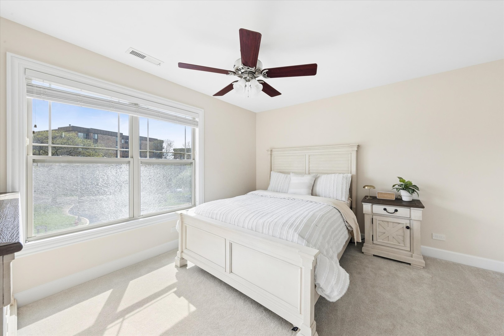 409 Provence Court Lisle, IL 60532 - Photo 13 of 24 a bedroom with a bed and window