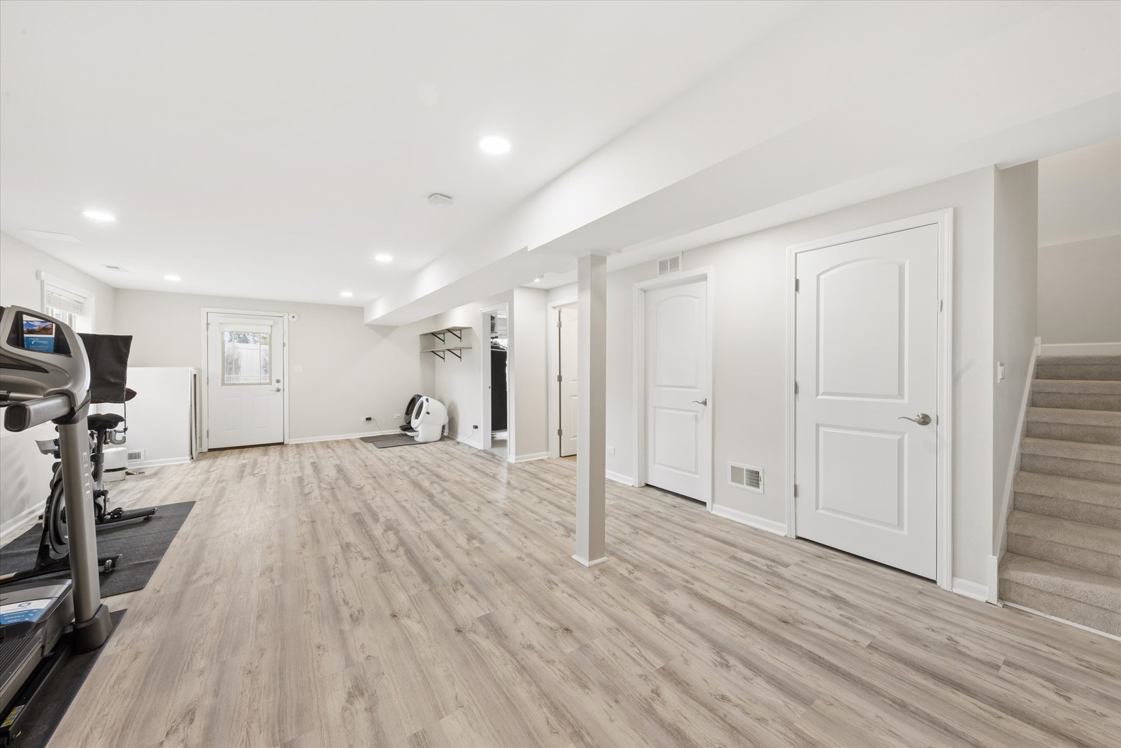 409 Provence Court Lisle, IL 60532 - Photo 19 of 24 a view of a livingroom with a furniture and wooden floor