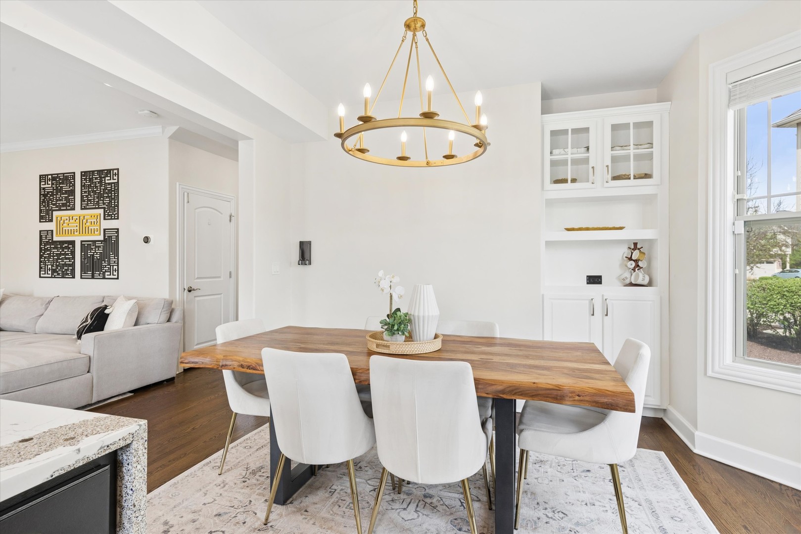 409 Provence Court Lisle, IL 60532 - Photo 6 of 24 a view of a dining room with furniture and wooden floor