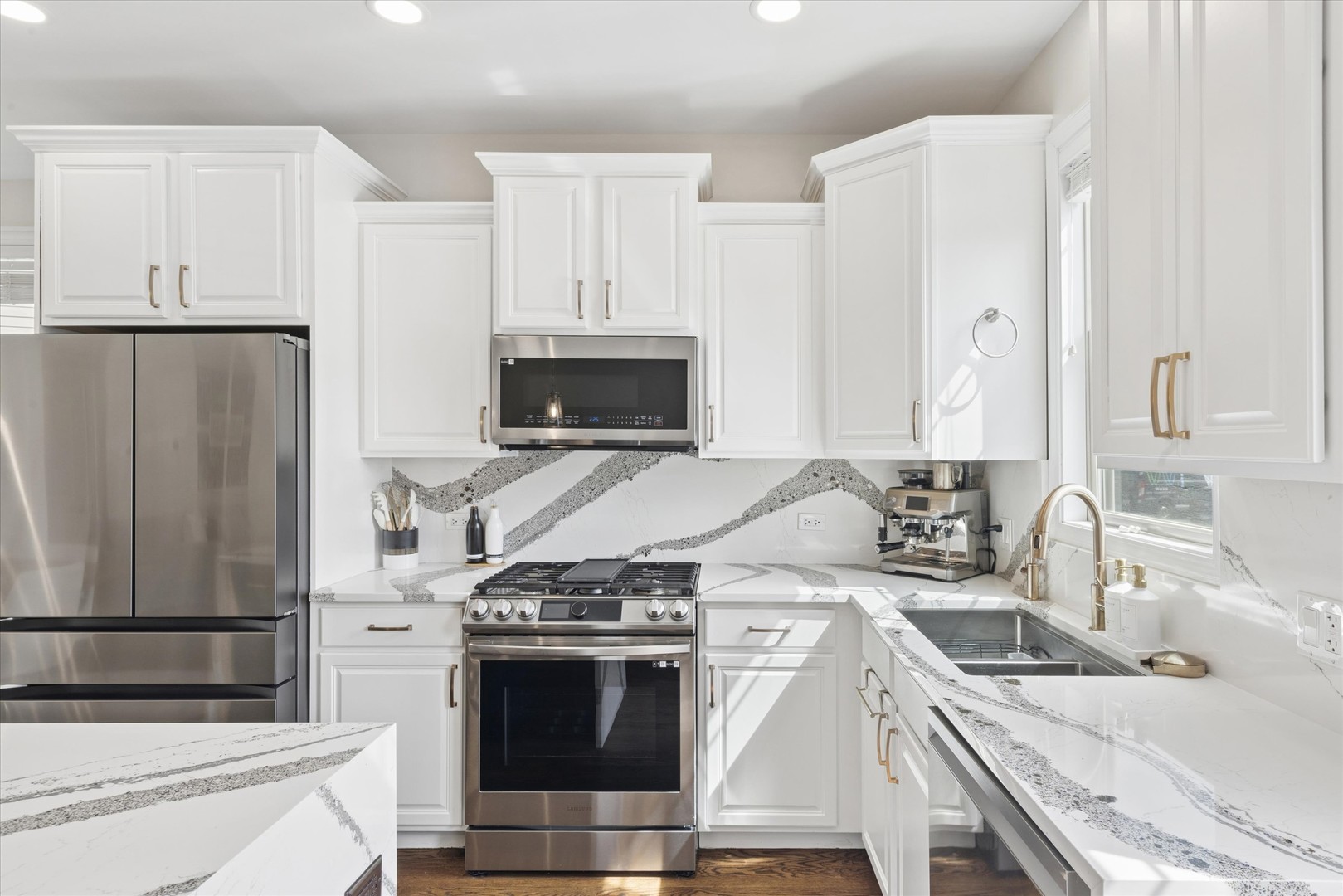409 Provence Court Lisle, IL 60532 - Photo 8 of 24 a kitchen with granite countertop a sink stove and refrigerator