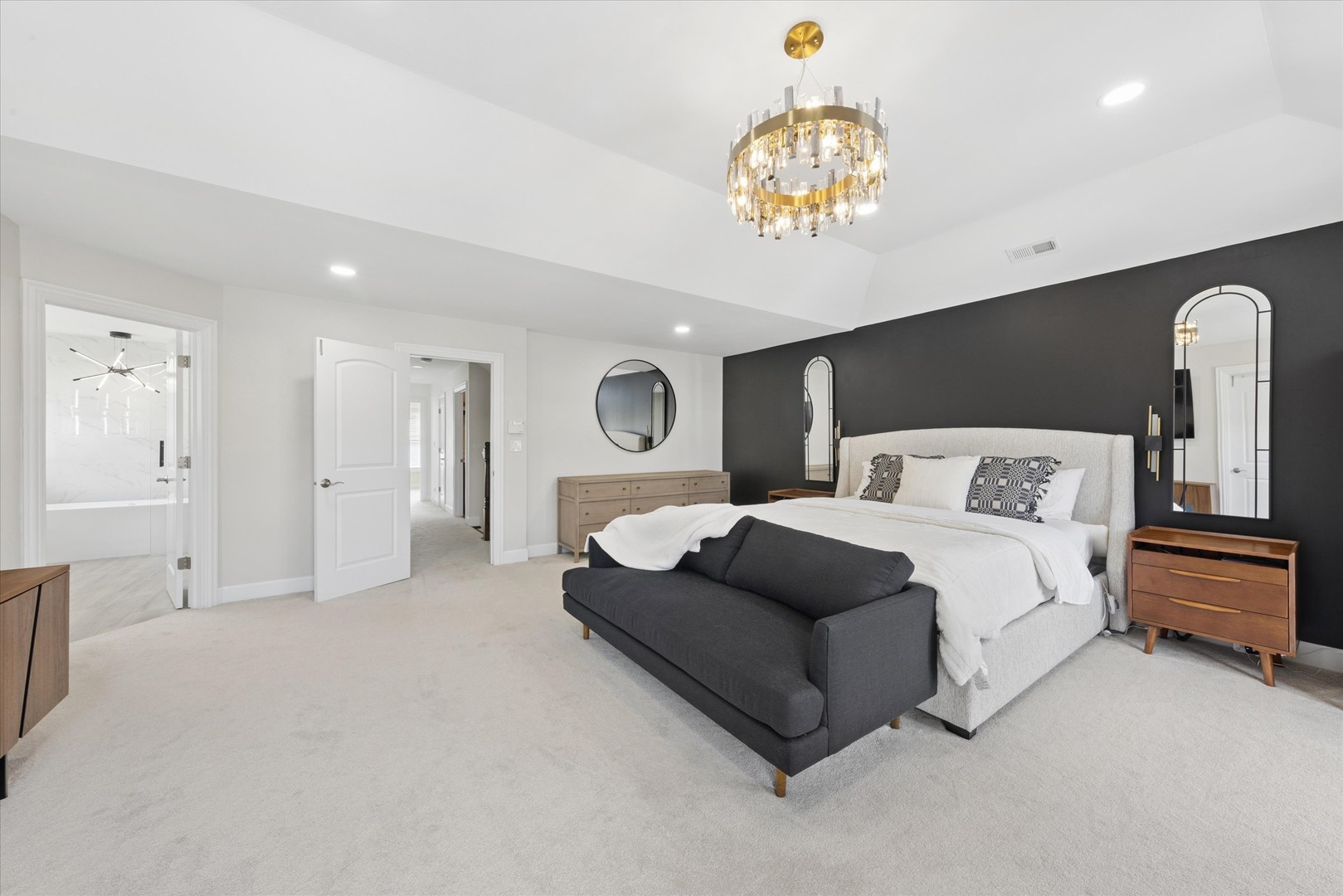 409 Provence Court Lisle, IL 60532 - Photo 10 of 24 a spacious bedroom with a bed and a chandelier