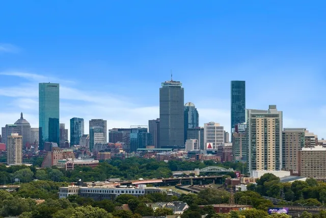 a city view with tall buildings