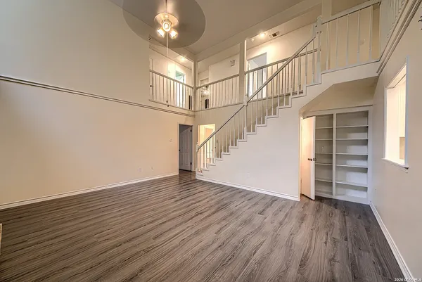 a view of entryway with wooden floor