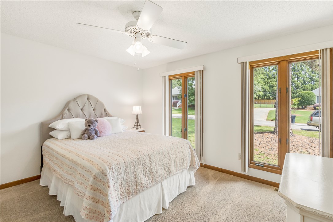 207 Laurel Ridge Road Anderson, SC 29621 - Photo 28 of 50 A restful bedroom offers comfort, featuring a ceiling fan and generous windows.