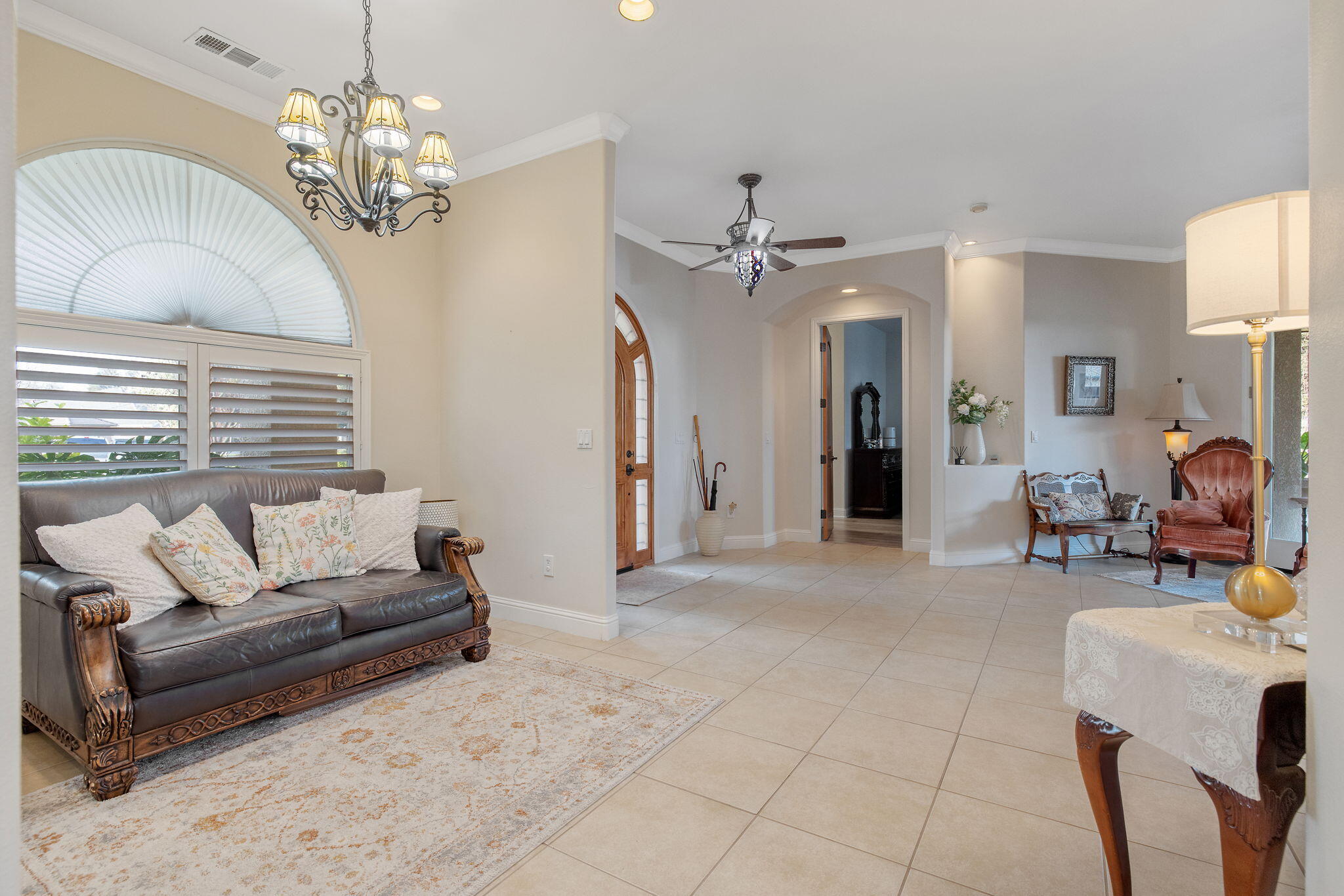 729 St Thomas Court Exeter, CA 93221 - Photo 24 of 66 a living room with furniture and a chandelier