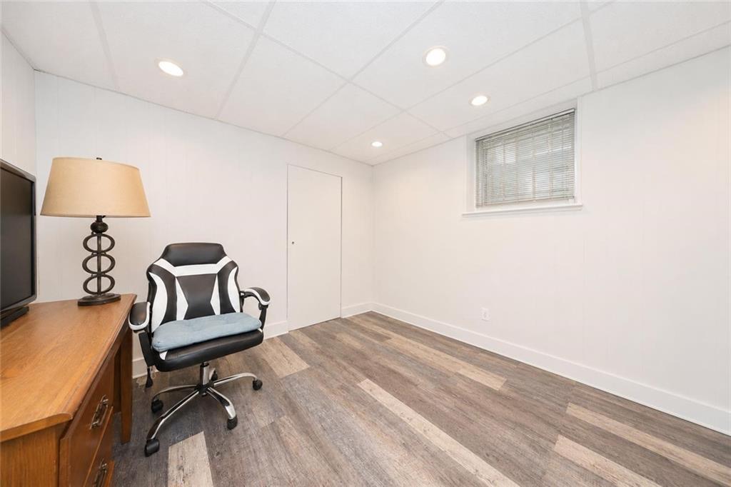 1 Bay Ridge Parkway Brooklyn, NY 11209 - Photo 29 of 38 a bedroom with a bed and a chair