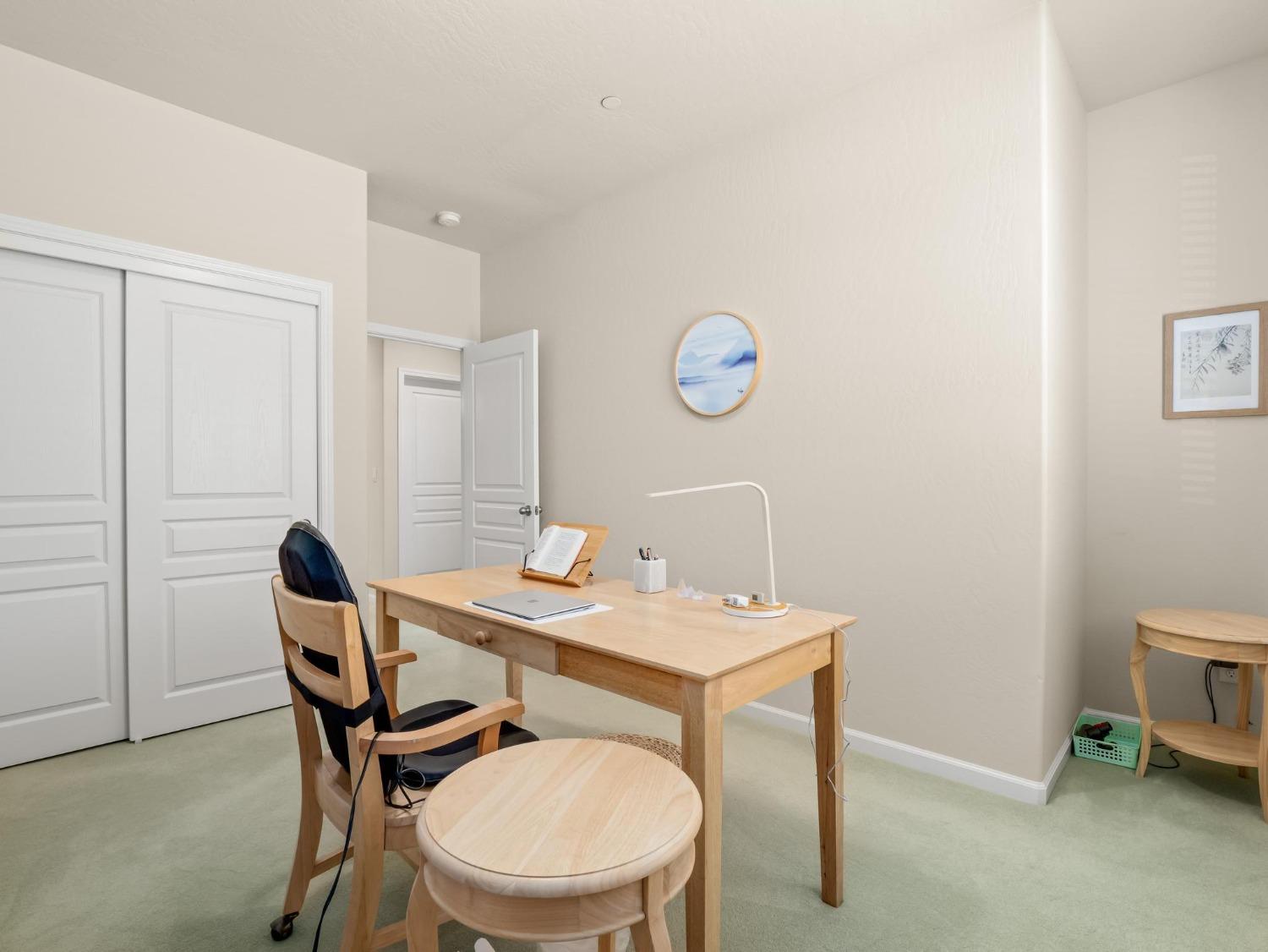 1012 Las Rosas Avenue Clovis, CA 93619 - Photo 17 of 36 a view of a workspace with furniture