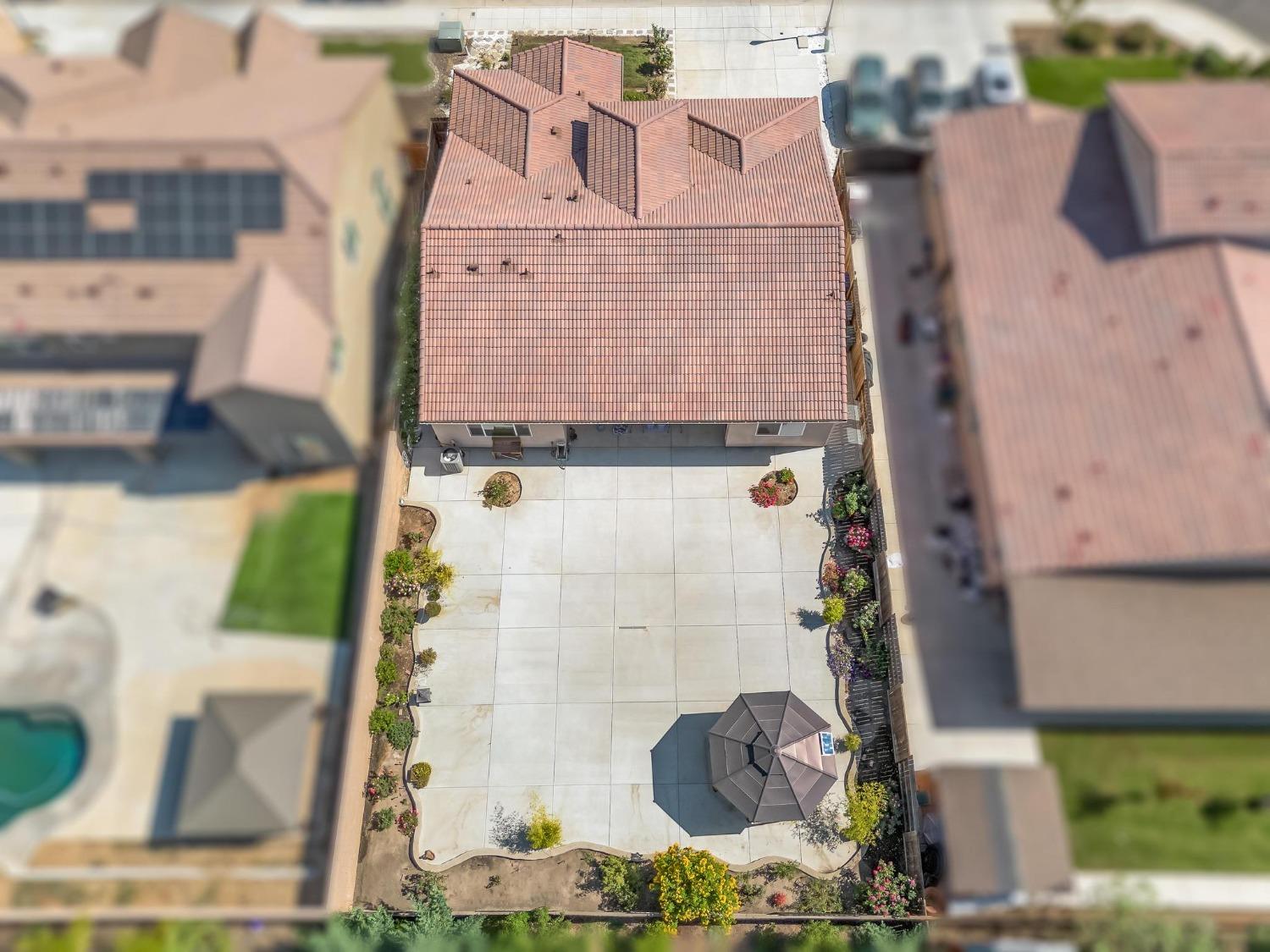1012 Las Rosas Avenue Clovis, CA 93619 - Photo 33 of 36 aerial view of a house with a potted plant