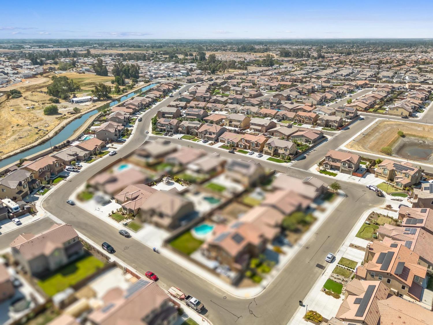 1012 Las Rosas Avenue Clovis, CA 93619 - Photo 36 of 36 an aerial view of a city