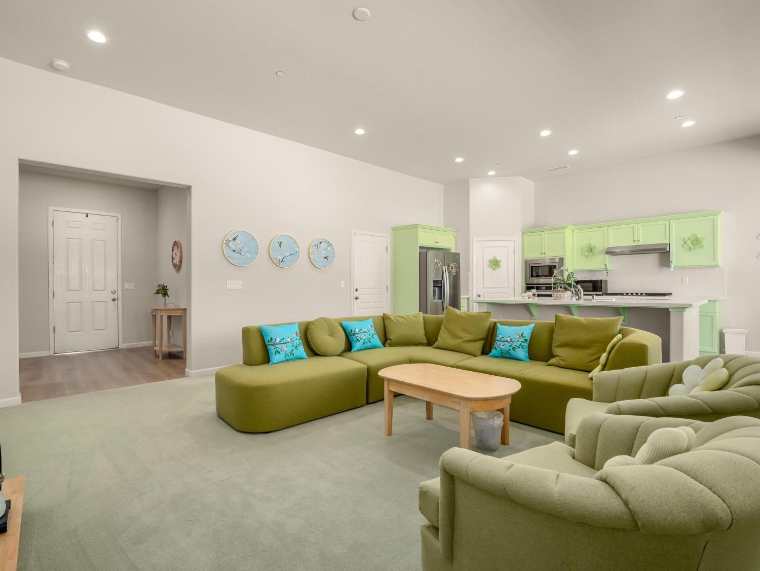 1012 Las Rosas Avenue Clovis, CA 93619 - Photo 4 of 36 a living room with furniture and a large window