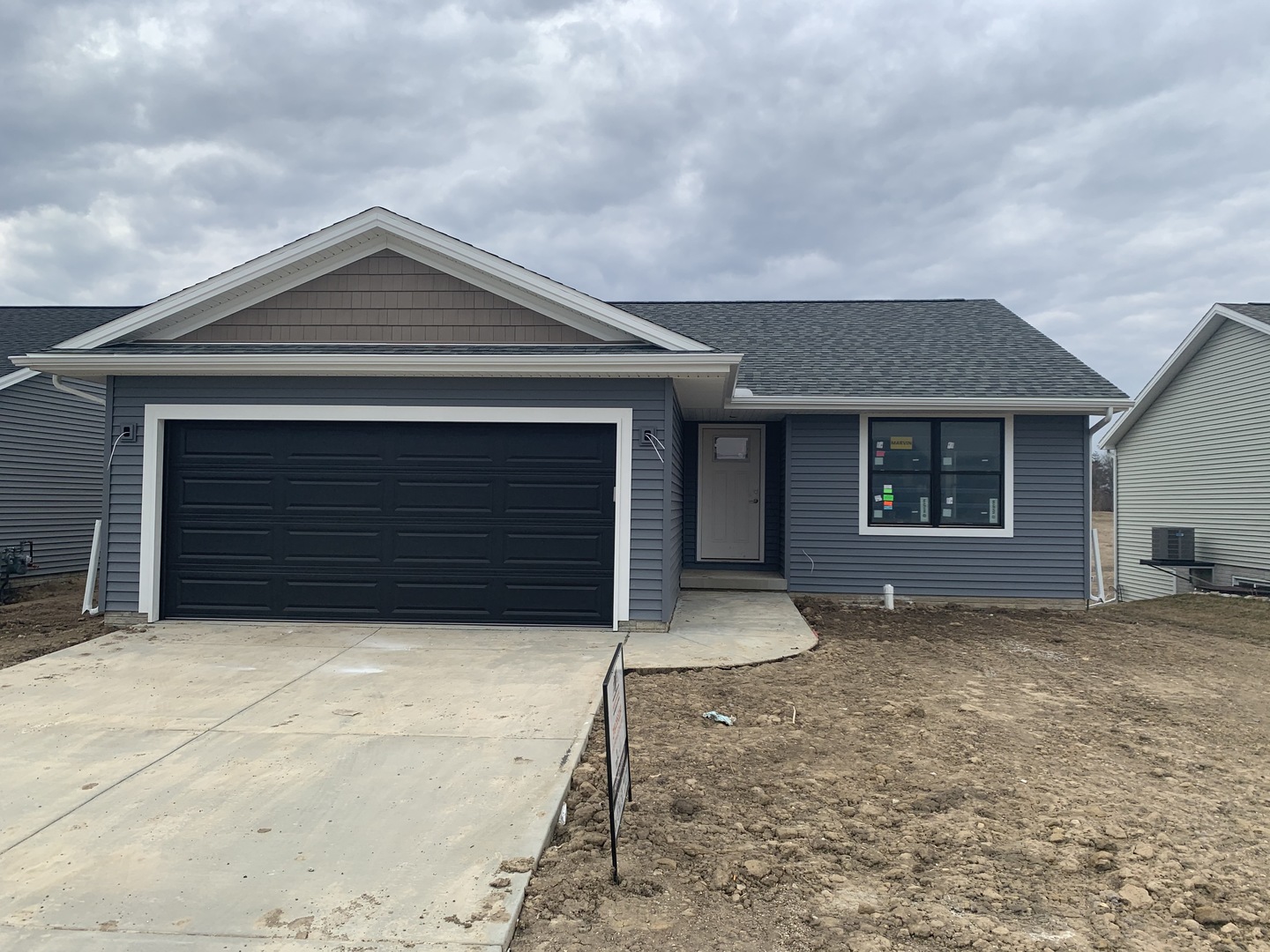 35 Winding Way Bloomington, IL 61705 - Photo 2 of 16 front view of a house with yard