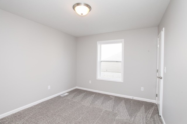 35 Winding Way Bloomington, IL 61705 - Photo 12 of 16 an empty room with a window