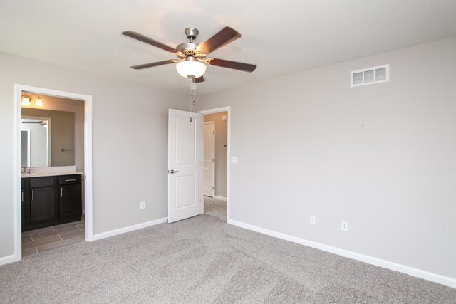 35 Winding Way Bloomington, IL 61705 - Photo 15 of 16 a view of a livingroom with a ceiling fan