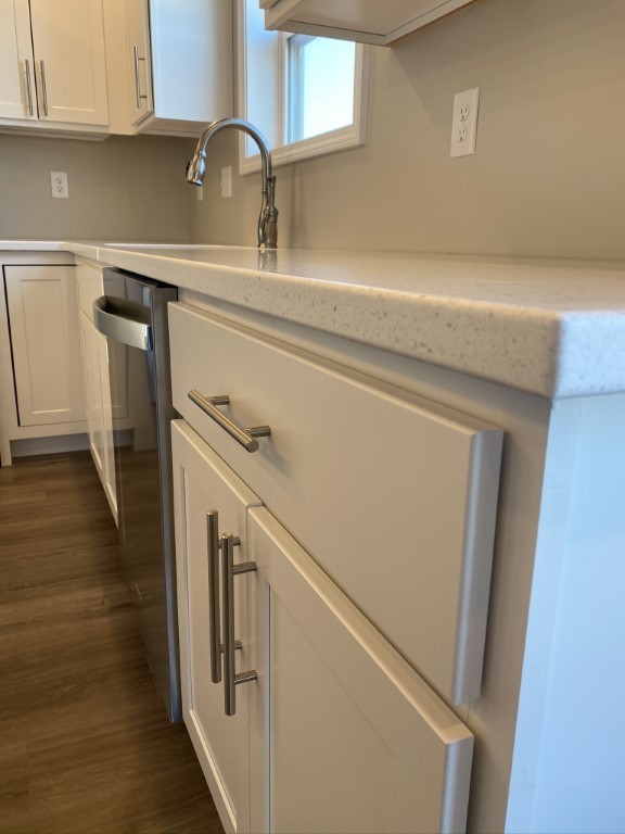 35 Winding Way Bloomington, IL 61705 - Photo 5 of 16 a close view of a sink and a refrigerator in a kitchen