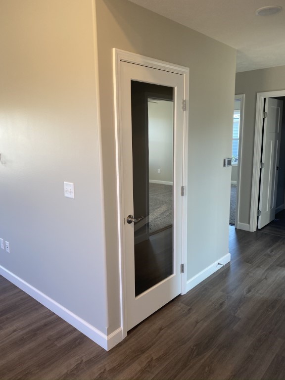 35 Winding Way Bloomington, IL 61705 - Photo 8 of 16 an empty room with wooden floor and closet