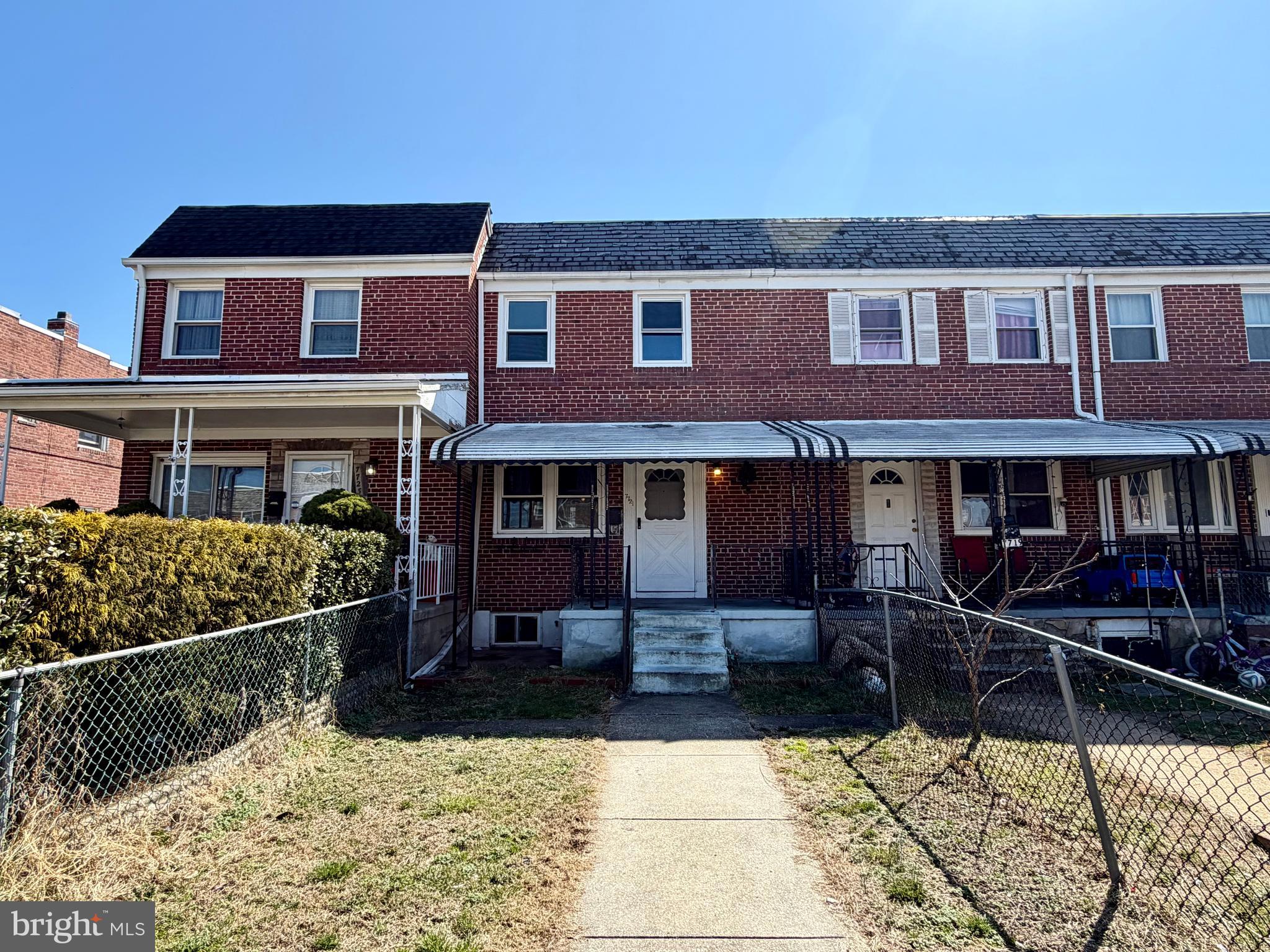 7721 Wynbrook Road Baltimore, MD 21224 - Photo 1 of 1 a front view of a house with yard