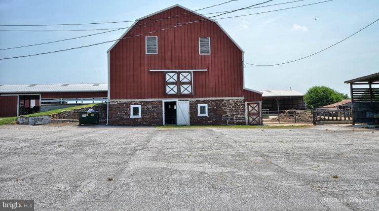 13127 Graceham Road Rocky Ridge, MD 21778 - Photo 19 of 19 a front view of a building with parking